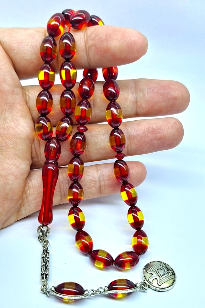 #1131 - S&uuml;rmeli Kehribar Kırmızı Tesbih 7.8x12 mm